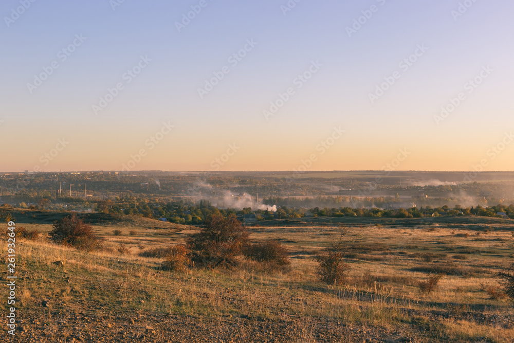 Smoke over the village in the autumn. Burning foliage in Ukraine. Smoke over the village in the autumn. Burning foliage in Ukraine.