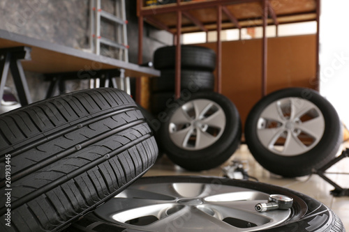Car tires in automobile service center, closeup © Pixel-Shot
