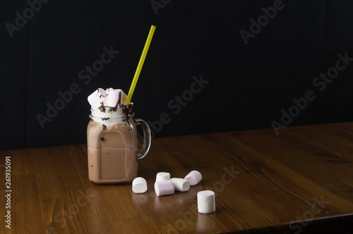 glass cups with handles in chocolate drinks and candies