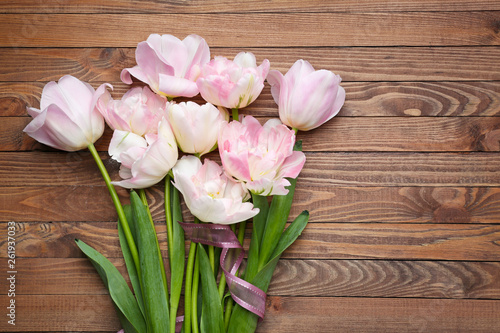 Fototapeta Naklejka Na Ścianę i Meble -  Beautiful tulip flowers on wooden background