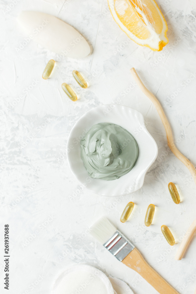home made spa cosmetic with citrus, volcanic clay, soap, essential oil on white gray background top view, organic natural hegiene cosmetic concept home made spa cosmetic with citrus, volcanic clay, soap, essential oil on white gray background top view, organic natural hegiene cosmetic concept