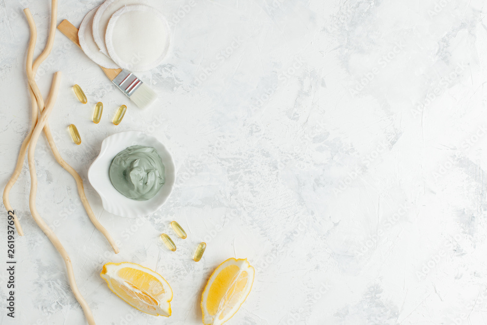 Natural herbal skin care products, top view ingredients volcanic clay mask, lemon on table concept natural face care. Facial treatment preparation background Natural herbal skin care products, top view ingredients volcanic clay mask, lemon on table concept natural face care. Facial treatment preparation background