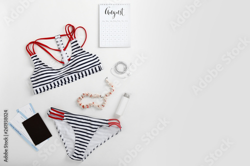 Stylish female swimming sui...