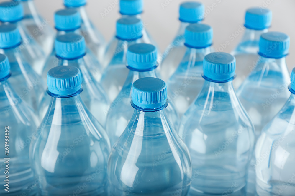 Bottles of water on light background Bottles of water on light background