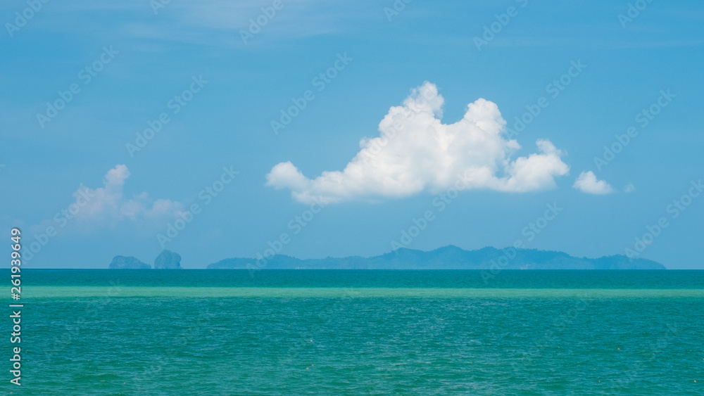 White cloud and blue sea scene.