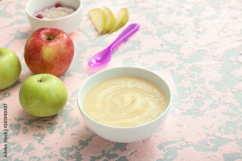 Bowl with healthy baby food on table Bowl with healthy baby food on table