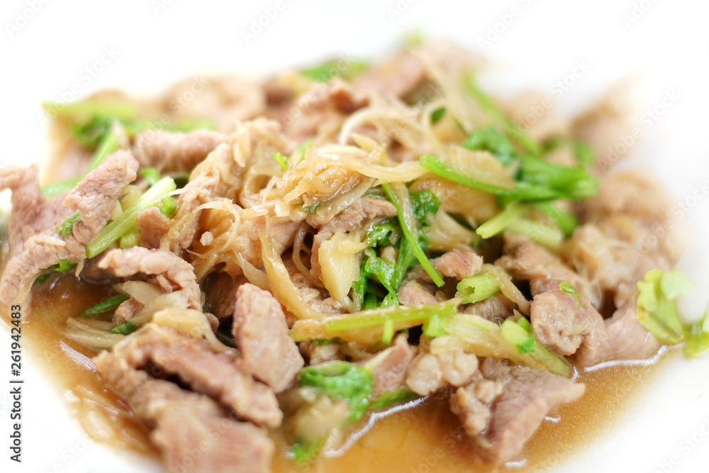 Stirred pork with sliced ginger, Ginger sliced for preparing food. Ginger is good herb for healthy. You can cooking food or making ginger juice for healthy drink. Selective focus and free copy space. Stirred pork with sliced ginger, Ginger sliced for preparing food. Ginger is good herb for healthy. You can cooking food or making ginger juice for healthy drink. Selective focus and free copy space.