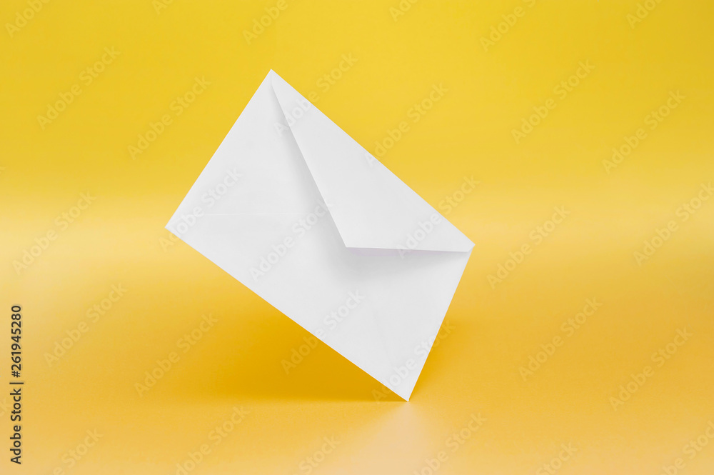 Blank white paper envelope on a single-colored background Blank white paper envelope on a single-colored background