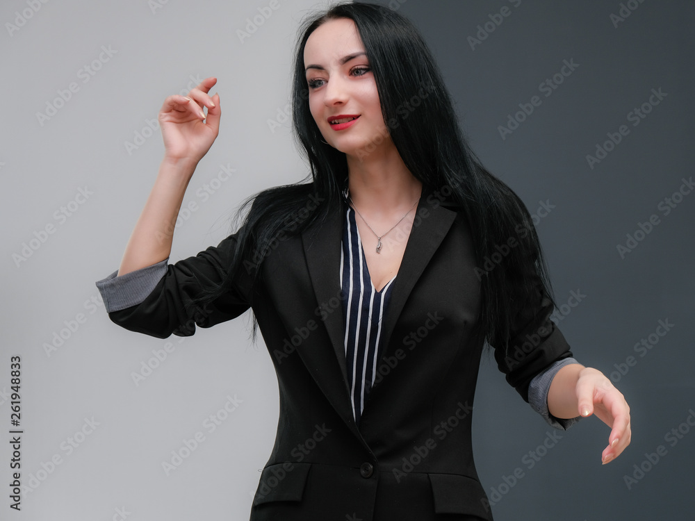 Concept Portrait of smiling business brunette Young woman, isolated on multicolored background. Female model looking at you and talking. Business suit. Concept Portrait of smiling business brunette Young woman, isolated on multicolored background. Female model looking at you and talking. Business suit.