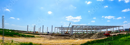 Panoramic view on landscape transform into industrial building machinery, people are working
