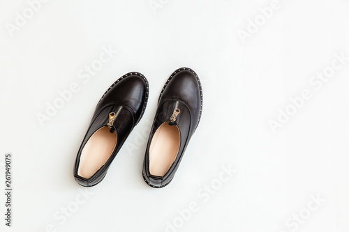 Stylish female spring or autumn shoes in black color. Beauty and fashion concept. Flat lay, top view 