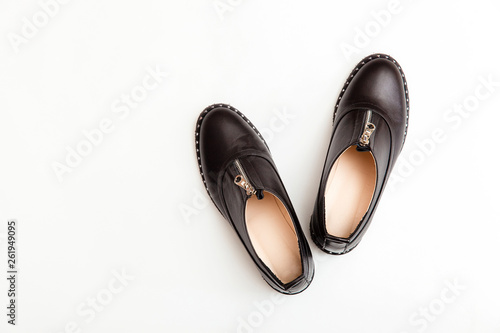 Stylish female spring or autumn shoes in black color. Beauty and fashion concept. Flat lay, top view 
