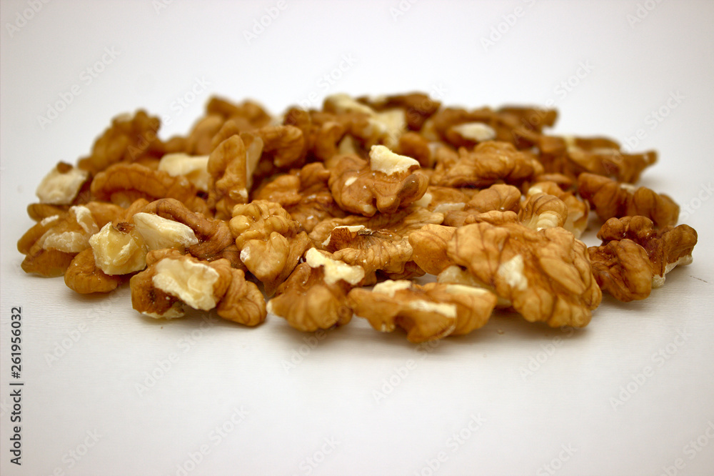 Walnut Kernels (Other Names: Juglans Regia, Persian Walnut, English Walnut, Circassian Walnut). Isolated Image On A White Background Walnut Kernels (Other Names: Juglans Regia, Persian Walnut, English Walnut, Circassian Walnut). Isolated Image On A White Background
