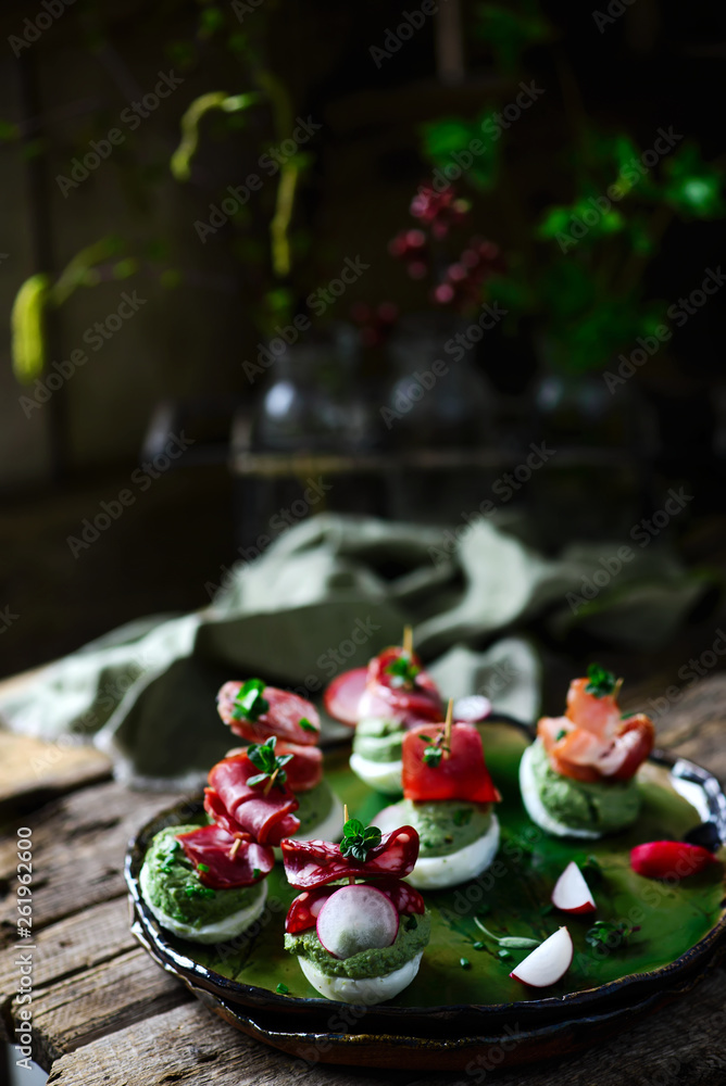 sweet pea and avocado deviled eggs.style rustic. sweet pea and avocado deviled eggs.style rustic.