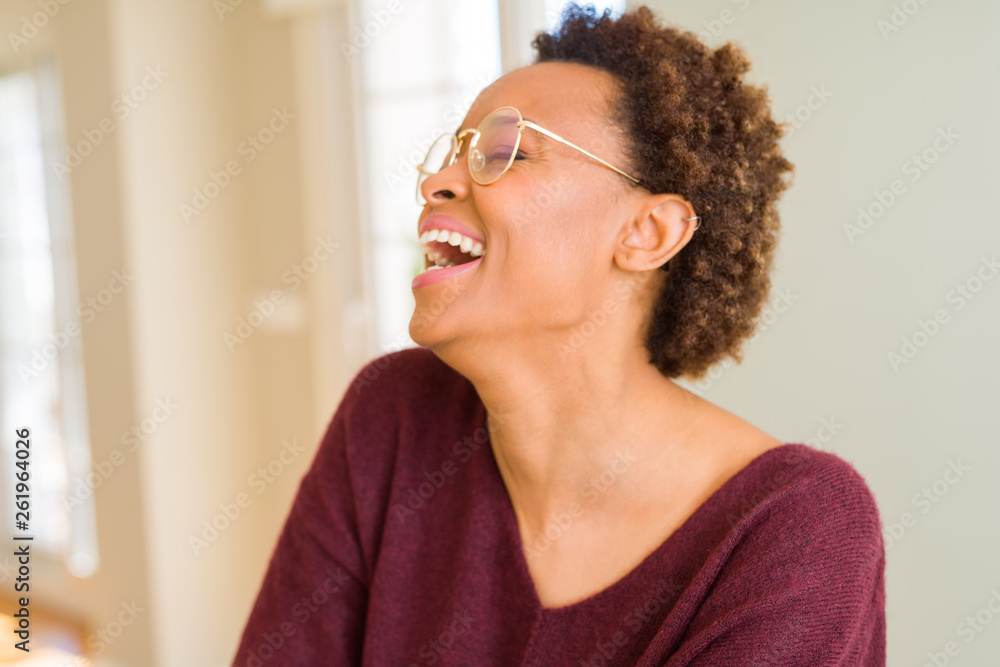 Beautiful young african woman with afro hair wearing glasses Beautiful young african woman with afro hair wearing glasses