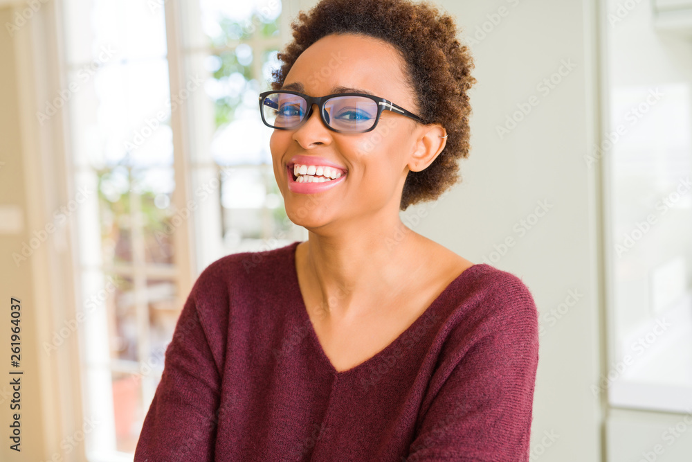 Beautiful young african woman with afro hair wearing glasses Beautiful young african woman with afro hair wearing glasses