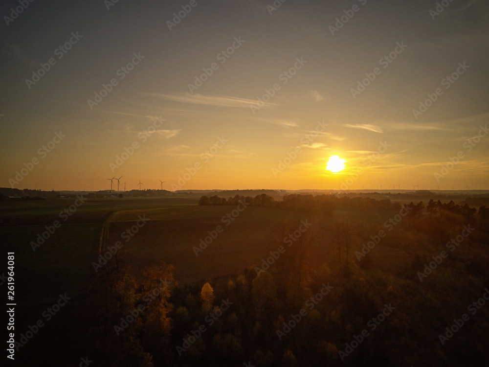 Sunset in front of wind turbines in Bavaria