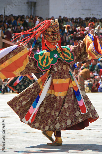 Traditional dances during a religious festival (tsechu) in a dzong in Thimphu (Bhutan)