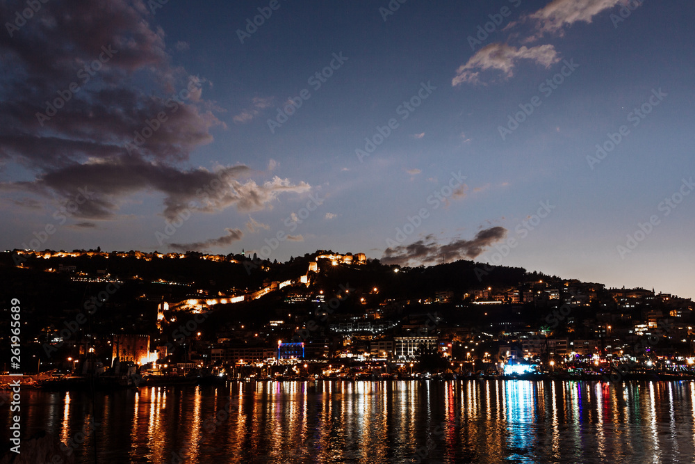 Night view of harbour, fortress and ancient shipyard in Alanya, Turkey Night view of harbour, fortress and ancient shipyard in Alanya, Turkey