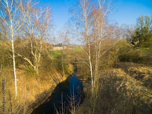 Destroyed railway bridge over Sapina river in Kruklanki, Poland (former Kruglanken, East Prussia) photo