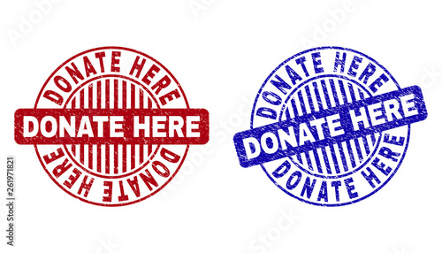 Grunge DONATE HERE round stamp seals isolated on a white background. Round seals with grunge texture in red and blue colors.