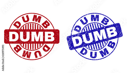 Grunge DUMB round stamp seals isolated on a white background. Round seals with grunge texture in red and blue colors. Vector rubber watermark of DUMB title inside circle form with stripes.