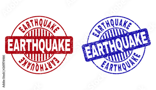 Grunge EARTHQUAKE round stamp seals isolated on a white background. Round seals with grunge texture in red and blue colors. Vector rubber overlay of EARTHQUAKE tag inside circle form with stripes. photo