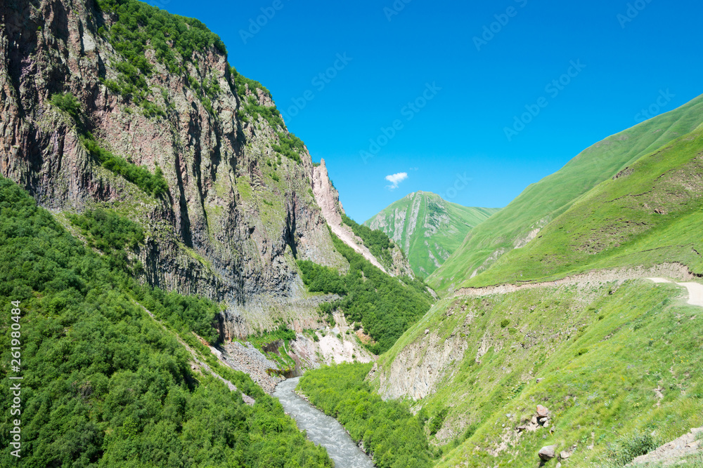 Kazbegi, Georgia - Jul 01 2018: Truso valley near Caucasus mountain. a famous landscape in Kazbegi, Mtskheta-Mtianeti, Georgia.