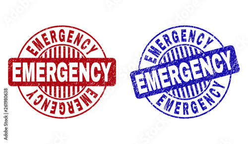 Grunge EMERGENCY round stamp seals isolated on a white background. Round seals with grunge texture in red and blue colors. Vector rubber imitation of EMERGENCY caption inside circle form with stripes.