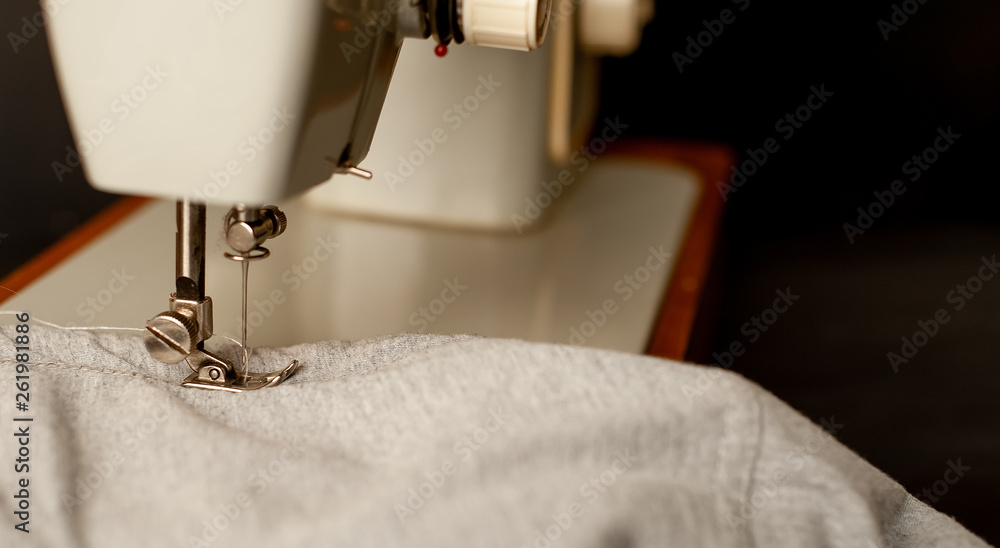 Background type of sewing machine, tailoring process. sewing workshop.