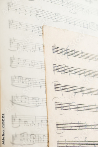 vintage paper sheet with handwritten musical notes