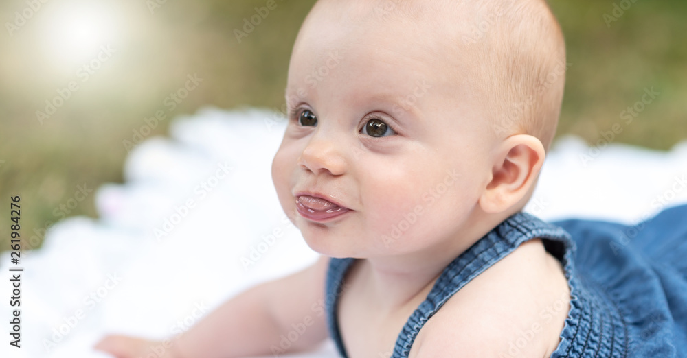 Portrait of cute baby girl, outdoors, light effect Portrait of cute baby girl, outdoors, light effect