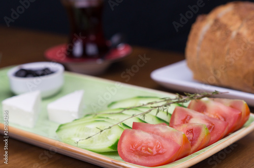 at breakfast, cucumber tomato cheese olive tray