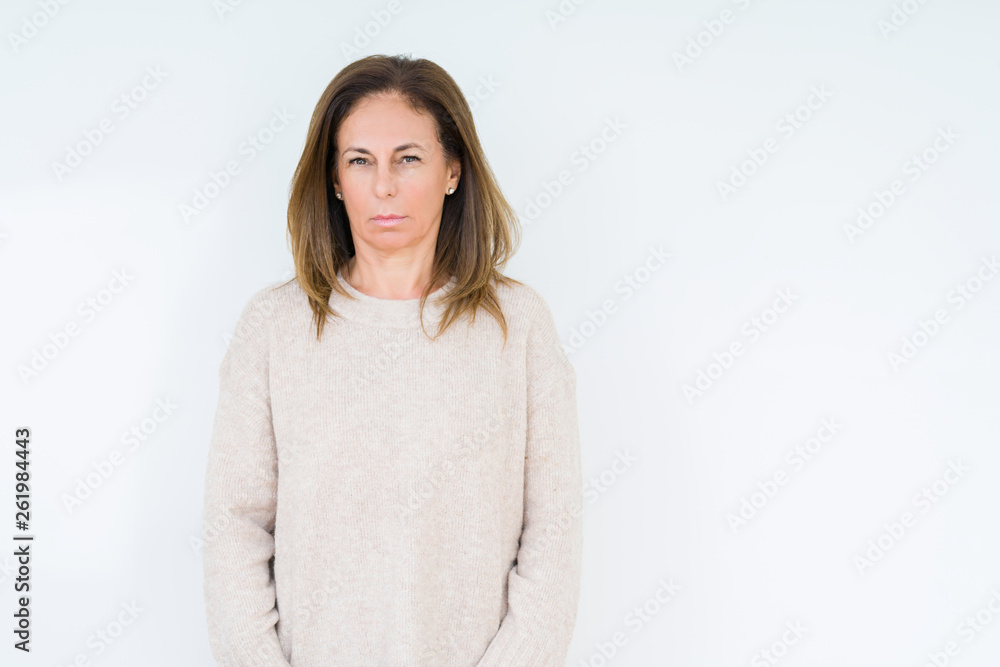 Beautiful middle age woman over isolated background skeptic and nervous, frowning upset because of problem. Negative person. Beautiful middle age woman over isolated background skeptic and nervous, frowning upset because of problem. Negative person.