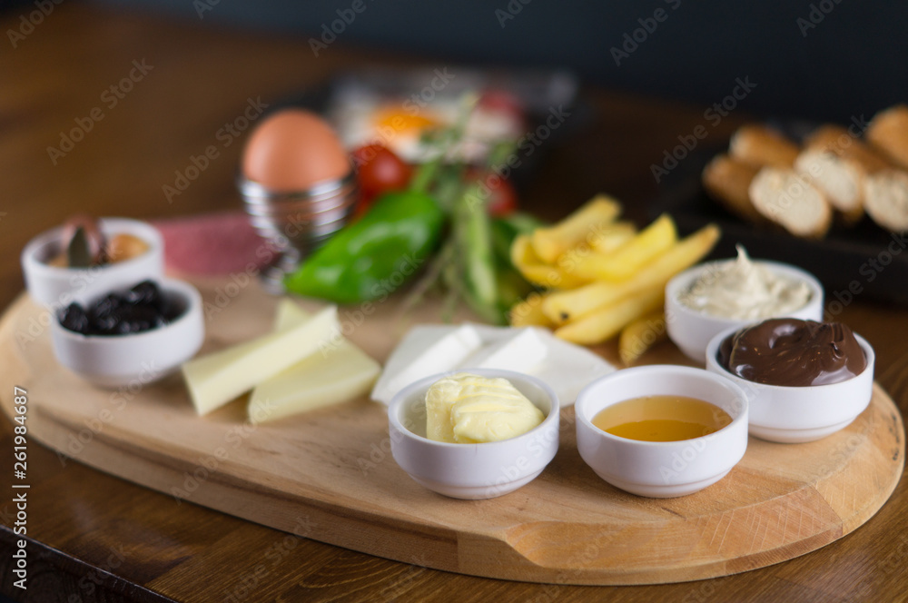 at breakfast, cucumber tomato cheese olive tray at breakfast, cucumber tomato cheese olive tray
