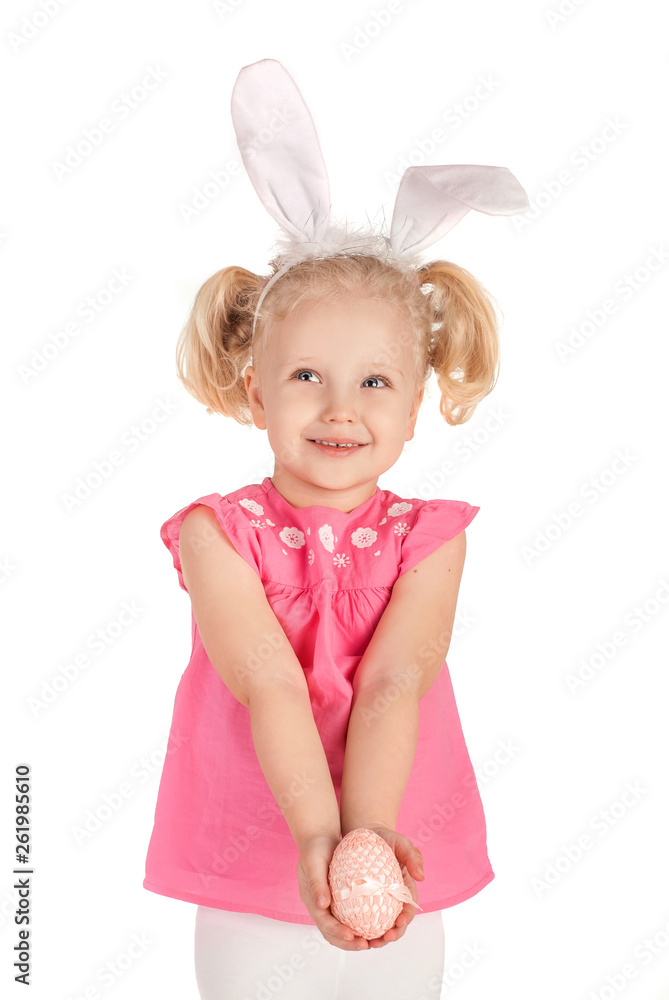 Little blonde girl in bunny ears headband with Easter egg on white background Little blonde girl in bunny ears headband with Easter egg on white background