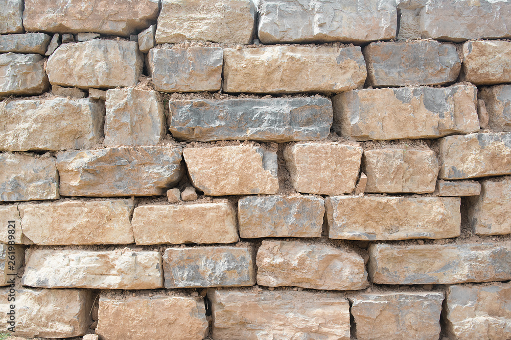 Rough old stone wall background. Natural rock pattern with empty copy space for Editor's text. Rough old stone wall background. Natural rock pattern with empty copy space for Editor's text.