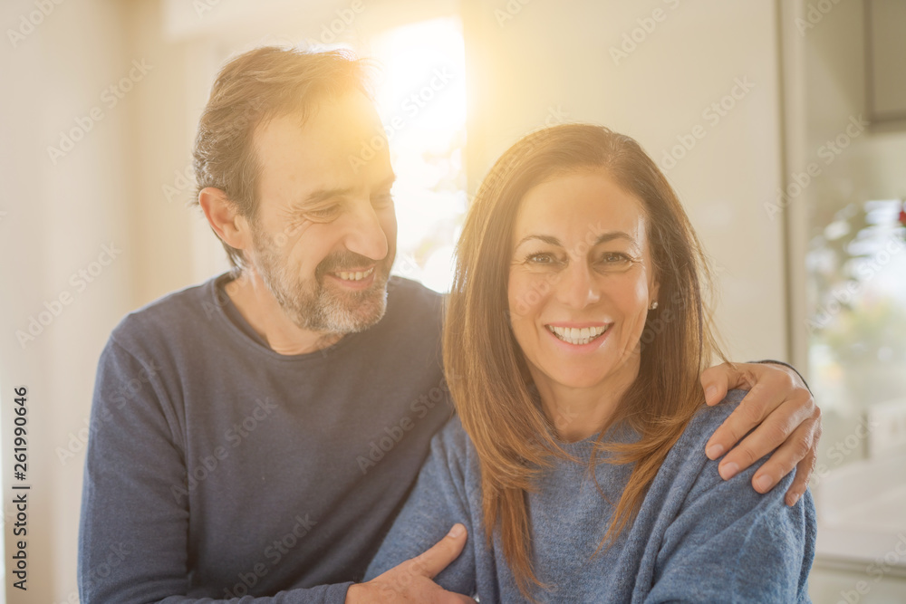 Romantic middle age couple in love at home Romantic middle age couple in love at home