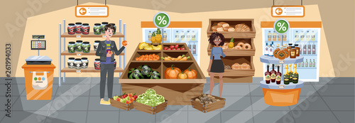Supermarket interior. People walking with the basket
