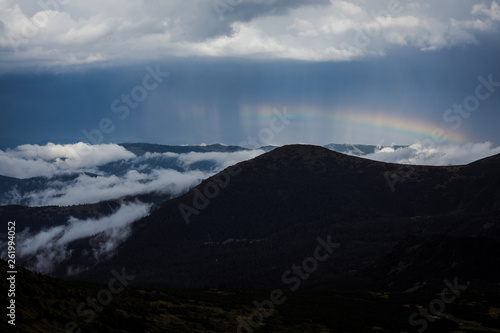 rainbow in the mountains after rain