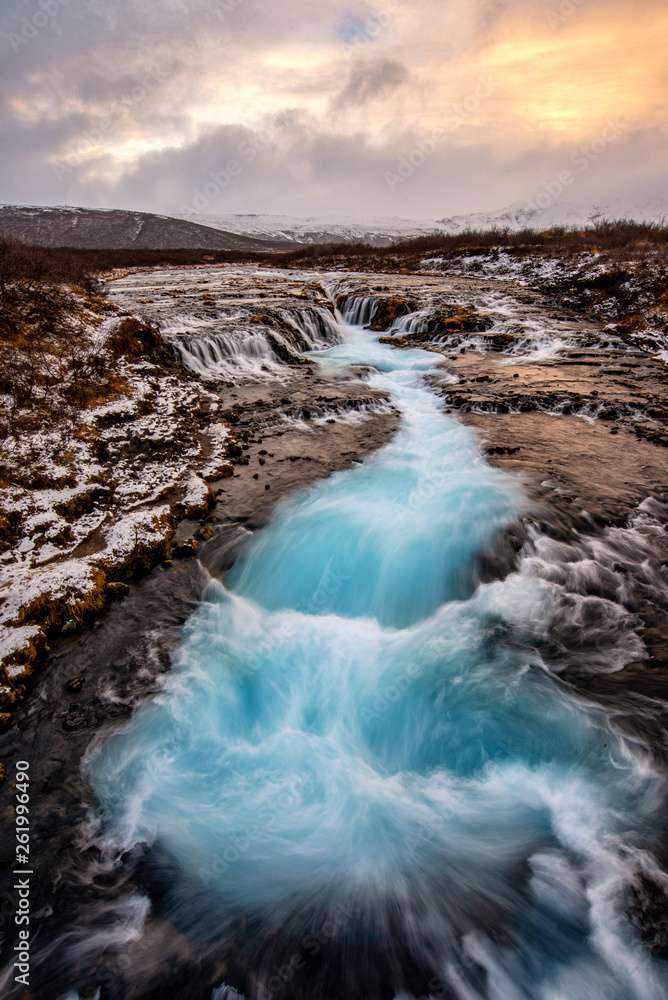 Beautiful Bruarfoss waterfall with turquoise water in Iceland.