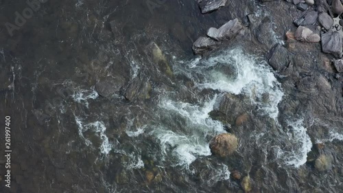 aerial overhead view of a rapid on mountain river - Poudre River in northern Colorado