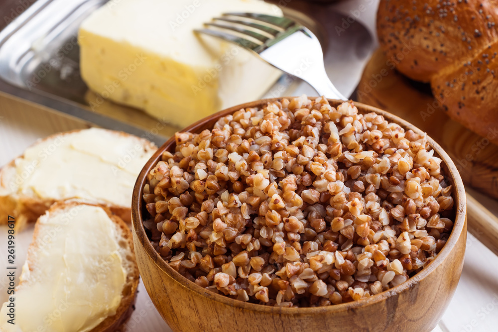 Breakfast Buckwheat porridge with two pieces of bread for breakfast Breakfast Buckwheat porridge with two pieces of bread for breakfast