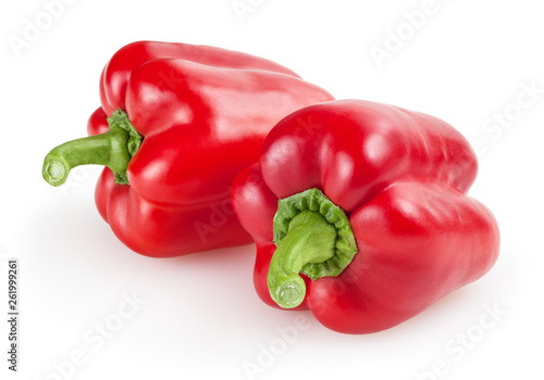 Obraz na płótnie Red bell peppers isolated on white background w salonie