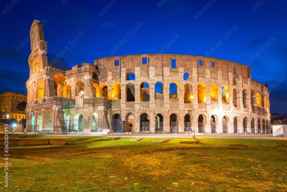 The Colosseum in Rome illuminated at night, Italy