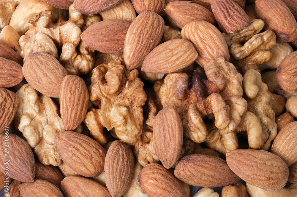 Fototapeta premium Walnut kernels, almonds and roasted cashew