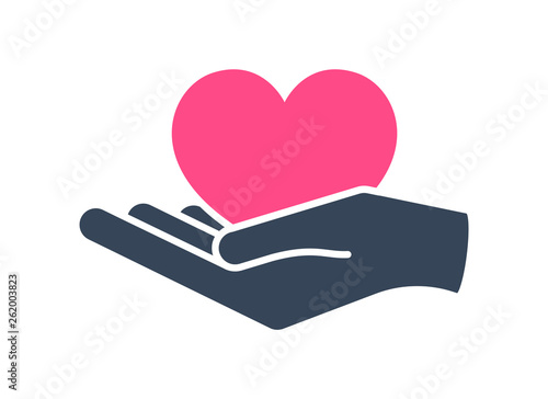 Heart in hand. Giving heart logo template for transplant ,organ, donation, charity, health, voluntary, nonprofit organization, isolated on white background, vector photo