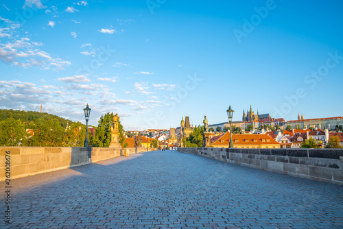 View of Prague, Charles bridge, Vltava river, St. Vitus cathedral on a sunny day