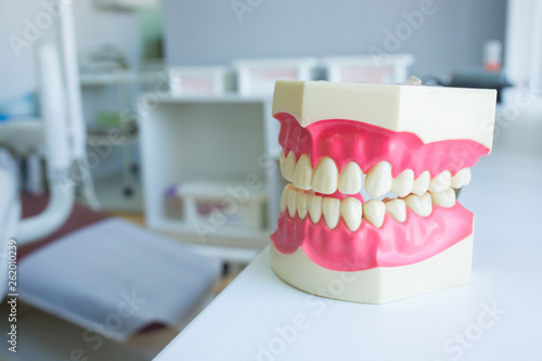 Medical plastic prosthesis in dental clinic. Orthodontic equipment, health care concept