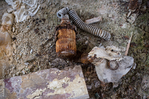 Old gas masks in abandoned school in Pripyat city in Chernobyl Exclusion Zone, Ukraine photo